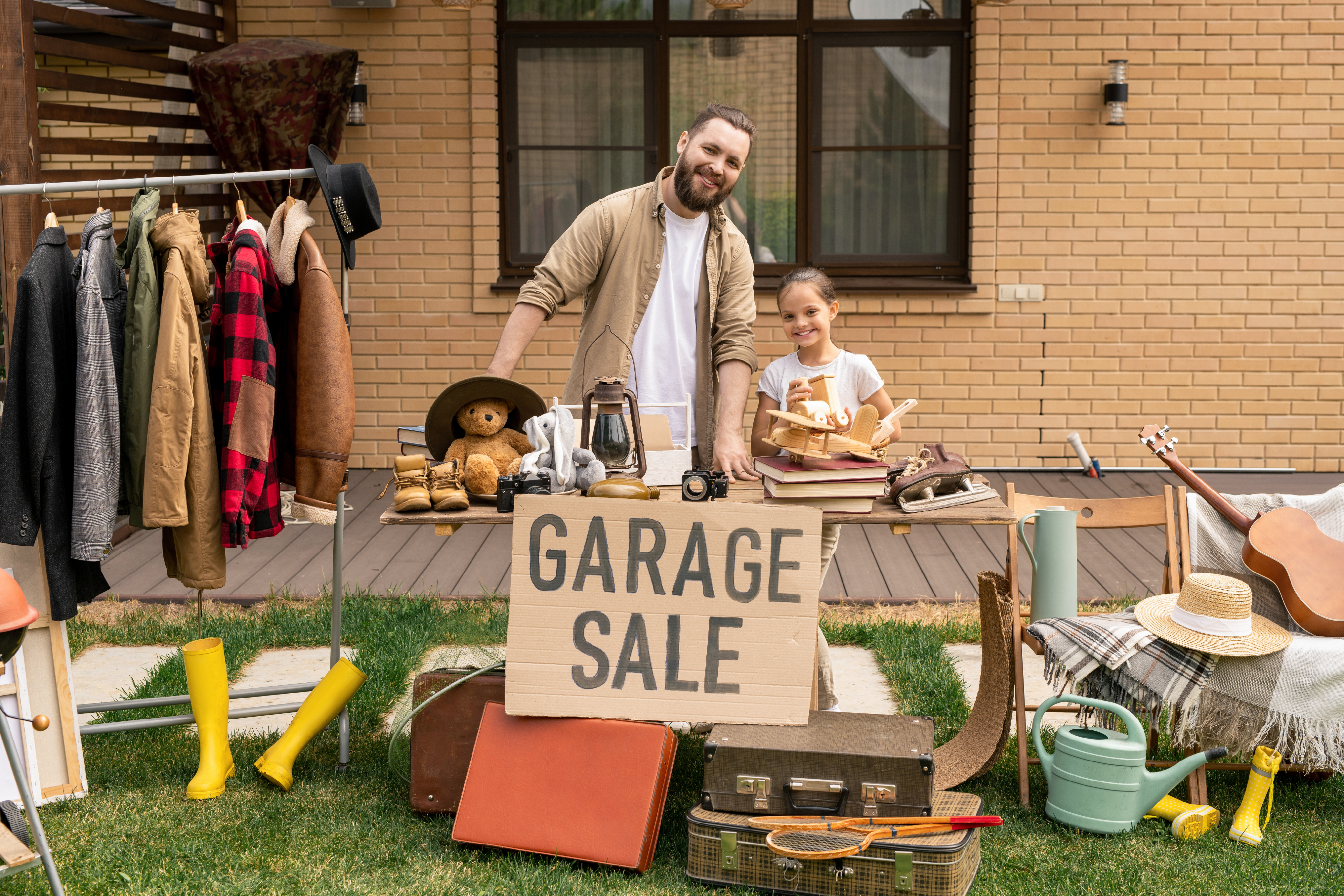 People browsing items at a neighborhood garage sale